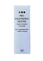 TOV Pro Volumizing Mousse packaging on a metallic surface